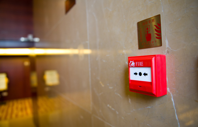 Fire alarm call point mounted on a wall